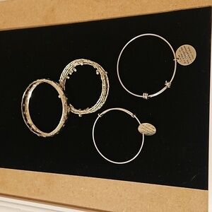 Lot of 4 silvertone bracelets